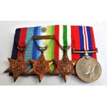 A group of four WWII medals awarded to Mr A.C.