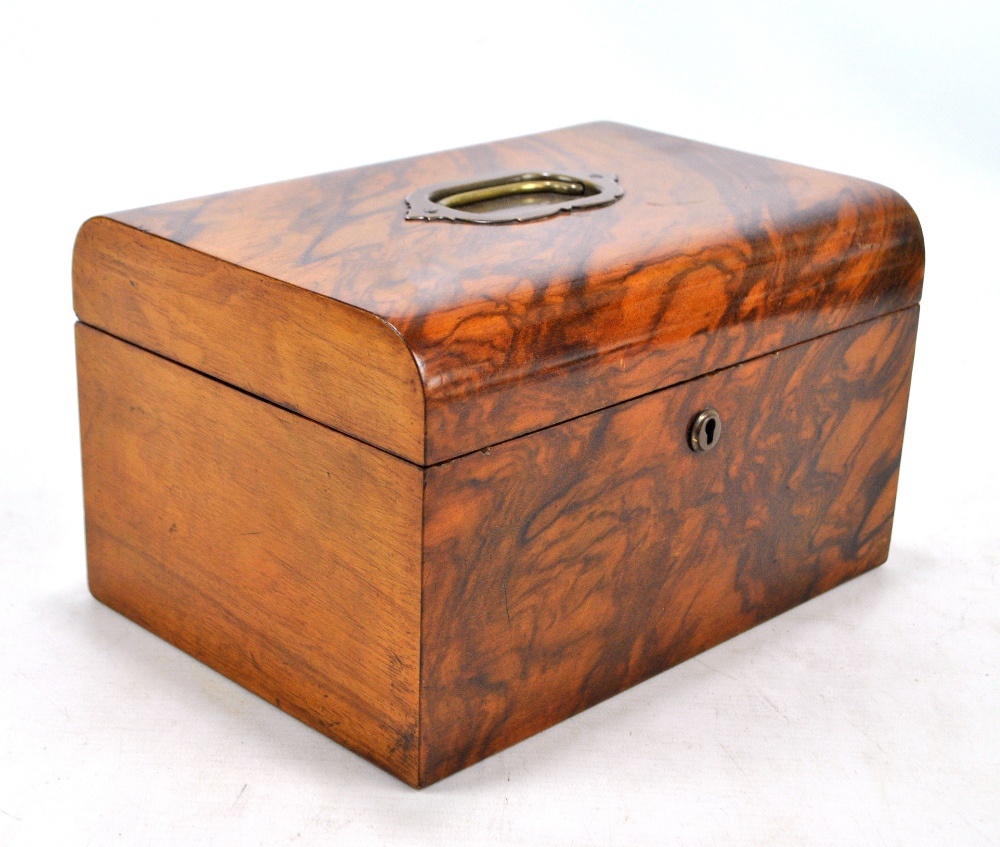 A Victorian walnut work box with silk lined interior (af) with brass handle to the hinged lid,