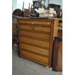 A Georgian oak and mahogany crossbanded chest of two short over four long drawers,