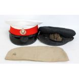 A Royal Navy officer's peaked cap with bullion work fouled anchor to front,