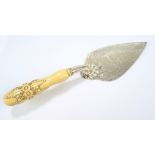 JOHN HARRISON & CO; a Victorian hallmarked silver trowel with engraved floral decoration,