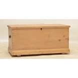 A pine blanket box with Arts and Crafts style handles, width 94cm.