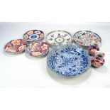 A group of various porcelain plates to include an 18th century Chinese Kangxi Famille Verte shallow