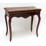 A late 19th century French walnut serpentine foldover card table on cabriole supports, width 80cm.