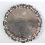 WALKER & HALL; a George V hallmarked silver shaped circular salver, with presentation inscription,