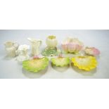 A group of Royal Worcester porcelain to include four shell shaped pin dishes,