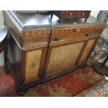 An early 20th century oak and bur walnut veneered sideboard raised on squat bun feet, width 130cm.