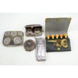 Two full and half sovereign cases, one in the form of a leather purse, a further Swiss coin purse,
