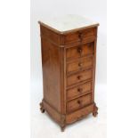 A late 19th century Continental walnut pot cupboard with white marble top above single drawer,