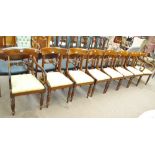 A set of eight early 19th century mahogany bar back dining chairs with padded drop-in seats and