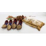 Two pairs of Indian slippers, a shawl and various garlands.