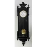 A 20th century ebonised Vienna style wall clock,