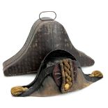 A cased naval officer's bicorn with bullion work to the front and sides,