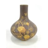 A Wedgwood basalt bottle vase with gilt pine cone decoration, height 21cm.