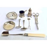 A group of small silver including a heart shaped dish, small circular dish, pepper,