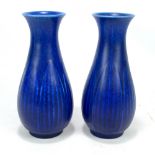 A pair of Pilkingtons Royal Lancastrian mottled blue baluster vases with flared rims, numbered 2842,