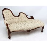 A Victorian walnut chaise longue, width 165cm.