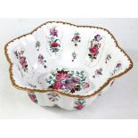 A late 19th century Samson porcelain bowl of shaped form, decorated in the Famille Rose style,