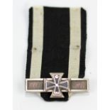 A German (Prussian) 1914 Wiederholungsspange to the 1870 Iron Cross in white metal with pebbling to