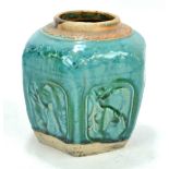 A late 19th century Chinese provincial ginger jar of hexagonal form with mould figural decoration,