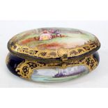 A circa 1900 Sèvres porcelain gilt heightened hand painted oval casket,