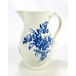An 18th century Worcester porcelain 'The Bouquet' pattern decorated baluster mask spout jug,