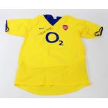 THIERRY HENRY; a signed replica Arsenal 2003-04 away shirt.