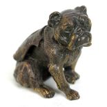 A novelty bronzed paperweight modelled as a bulldog with crest to back,