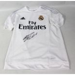 CRISTIANO RONALDO; a signed replica Real Madrid home shirt.