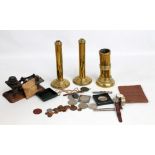 A small group of mixed collectors' items including postal scales and number of weights,