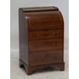 An Edwardian mahogany and satinwood crossbanded cylinder bureau of small proportions,