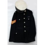 A Royal Marines officer's dress uniform comprising tunic with RM shoulder titles,