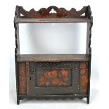 A tabletop cabinet with door to centre and carved foliate detail throughout, 54 x 40cm.