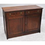A small early 20th century walnut buffet with two drawers above a pair of doors, width 118cm.
