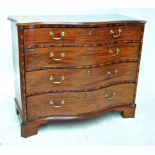 An 18th century and later mahogany serpentine chest of four long graduated drawers raised on