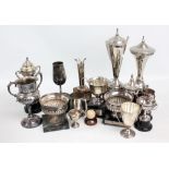 A quantity of golfing trophies, the majority silver plated,