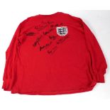 ENGLAND; a replica 1966 style shirt with ten signatures including Geoff Hurst,