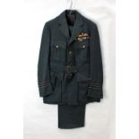 An RAF officer's dress uniform comprising jacket with cloth badge,