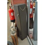 A metal cabinet with separate locks, 122 x 25.5cm.