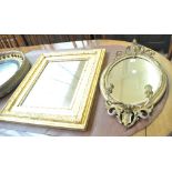 A 19th century oval gilt framed girandole (af), and a gilt framed bevelled mirror (2).