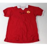 SIR BOBBY CHARLTON; a signed replica Manchester United retro-style no.