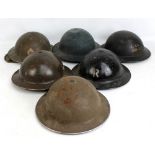 Six WWII period Brodie-type helmets including brown example with National Fire Service decal and