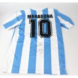 DIEGO MARADONA; a replica Argentina no.10 home shirt, signed to back.