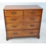 A late George III mahogany chest of two short above three long drawers on bracket feet, width 107cm.