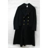 A Royal Navy officer's greatcoat with bullion work quadruple stripes and Elizabeth II cipher badges