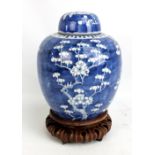 A large 19th century Chinese porcelain ginger jar and cover painted in underglaze blue with