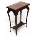 A small early 20th century card table with foldover with swivel top on cabriole legs, width 54cm.