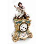 A late 19th century French porcelain clock painted with floral sprays,