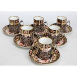 A set of six Royal Crown Derby Imari pattern decorated coffee cans and saucers, number 2451B,