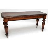 A Victorian hall/centre table with rounded rectangular top.